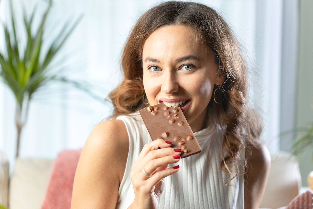 Woman chocolate eating